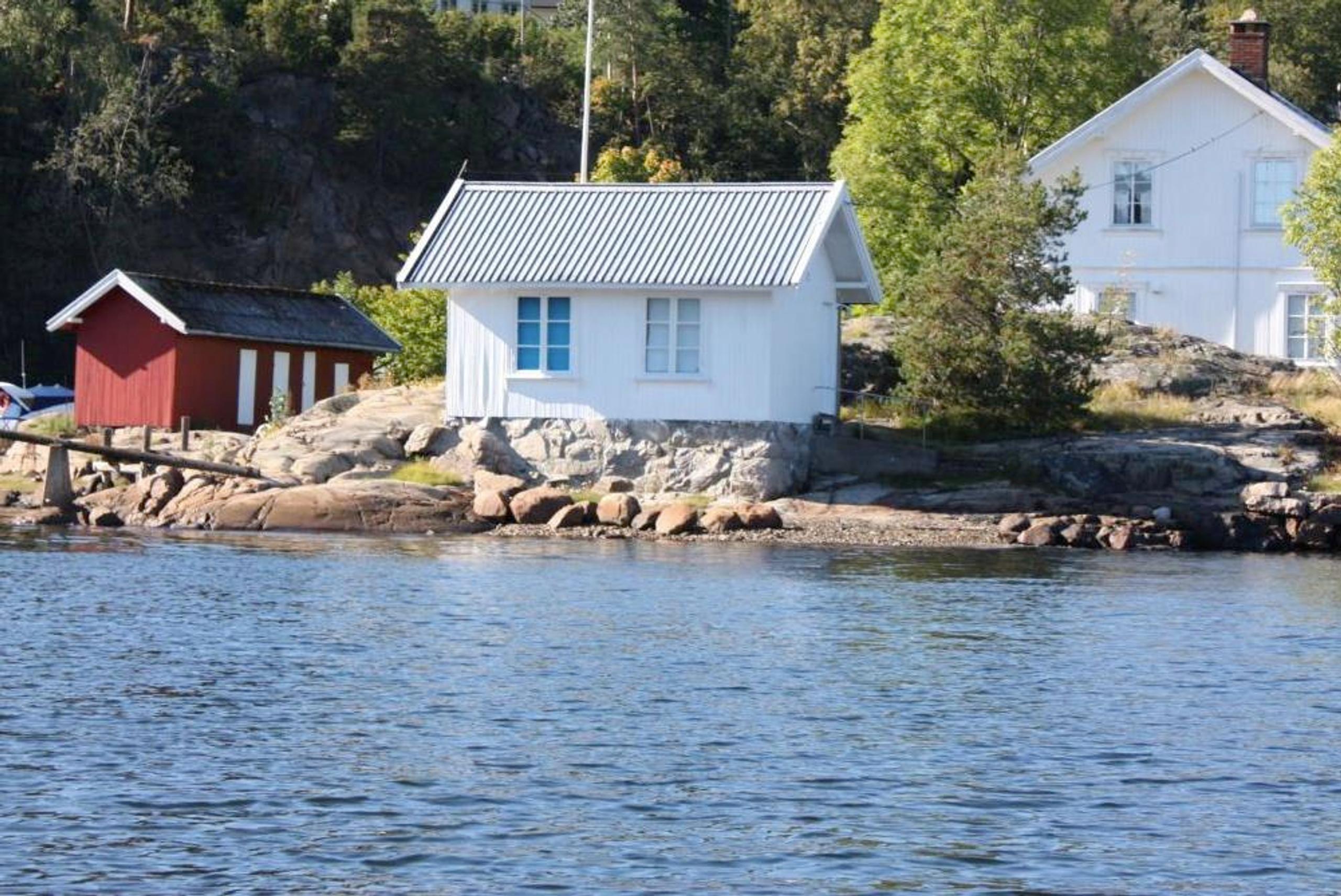White annex by the water front