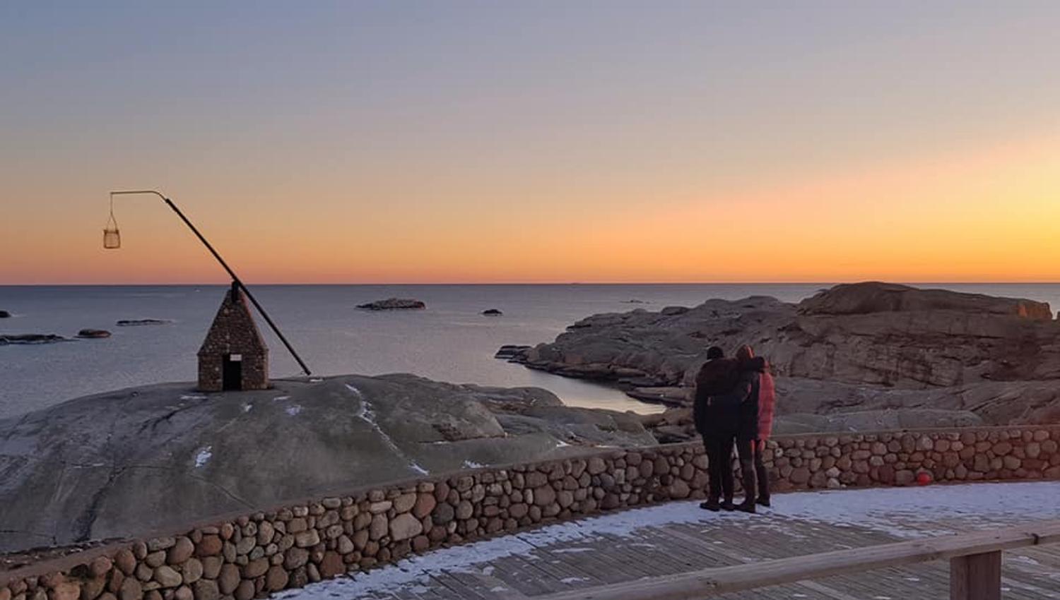 The End of the World with the tilting lighthouse and sunset