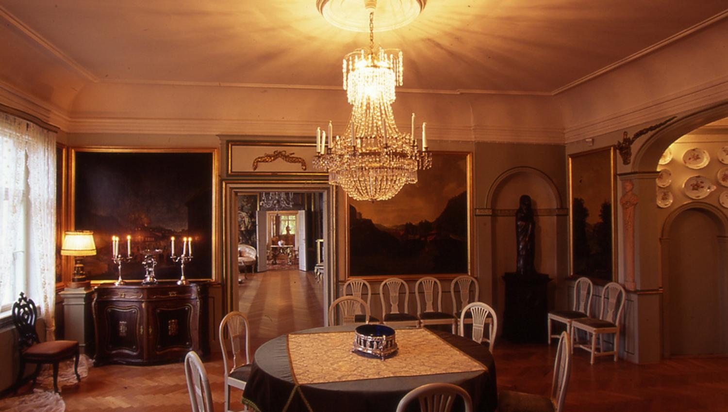 Impressive chandeliers light up the rooms.