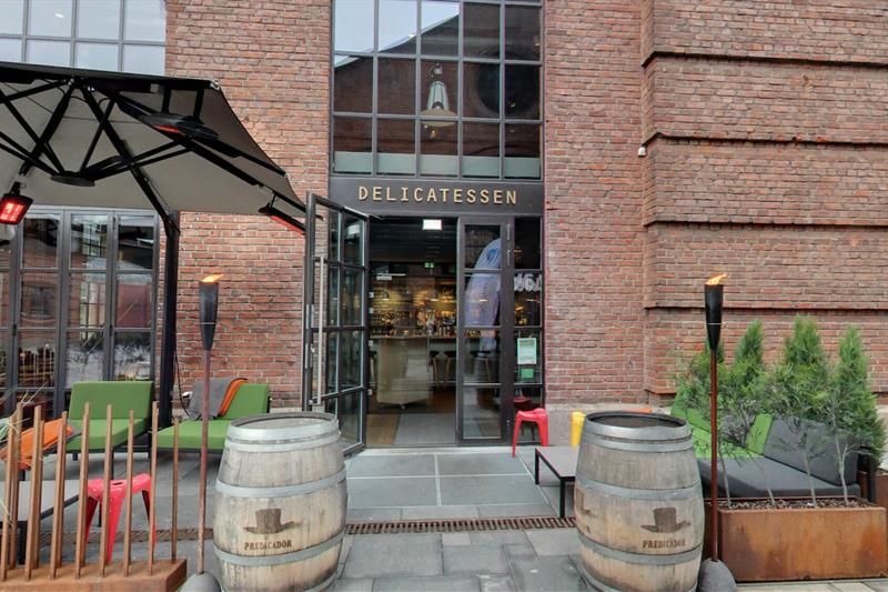 Restaurant exterior with outdoor seating.