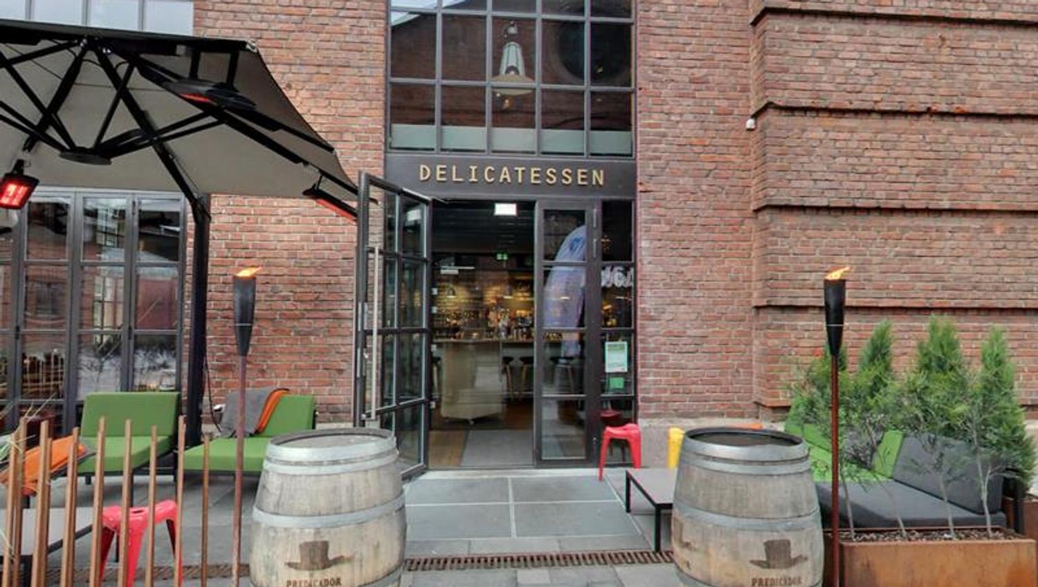 Restaurant exterior with outdoor seating.