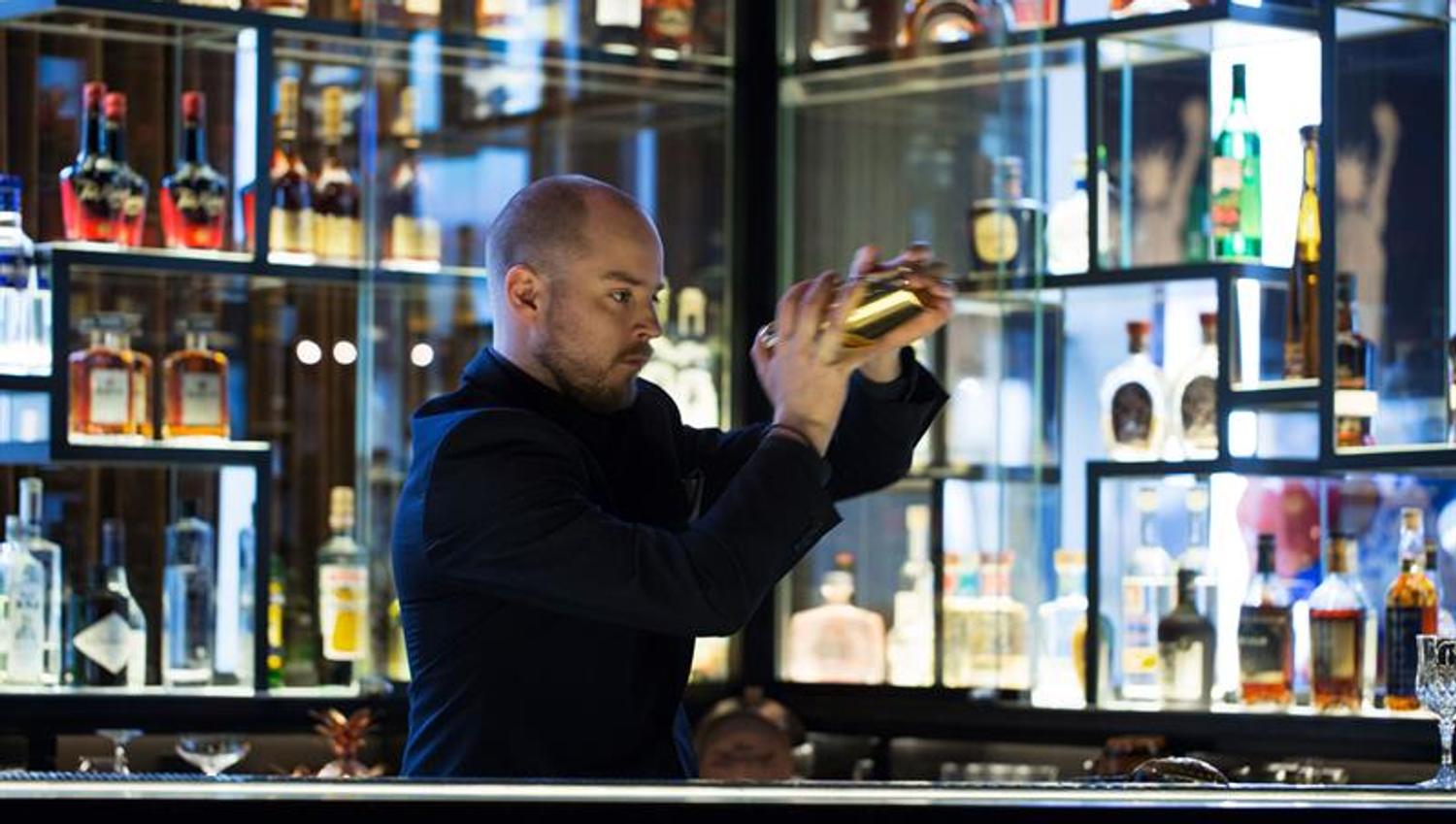bartender mixing a cocktail