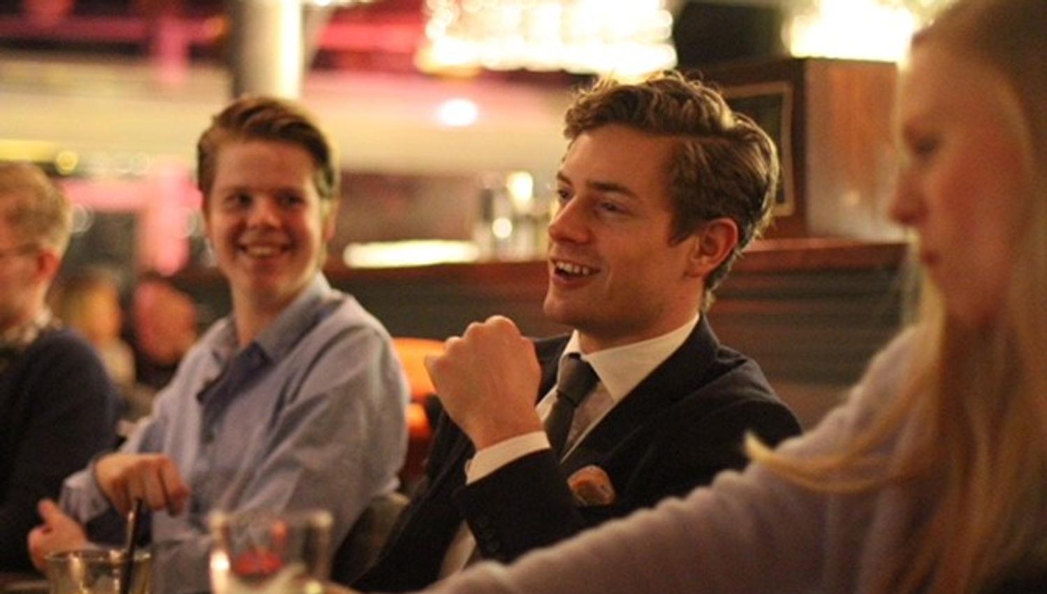 Guests having drinks at Toppen bar