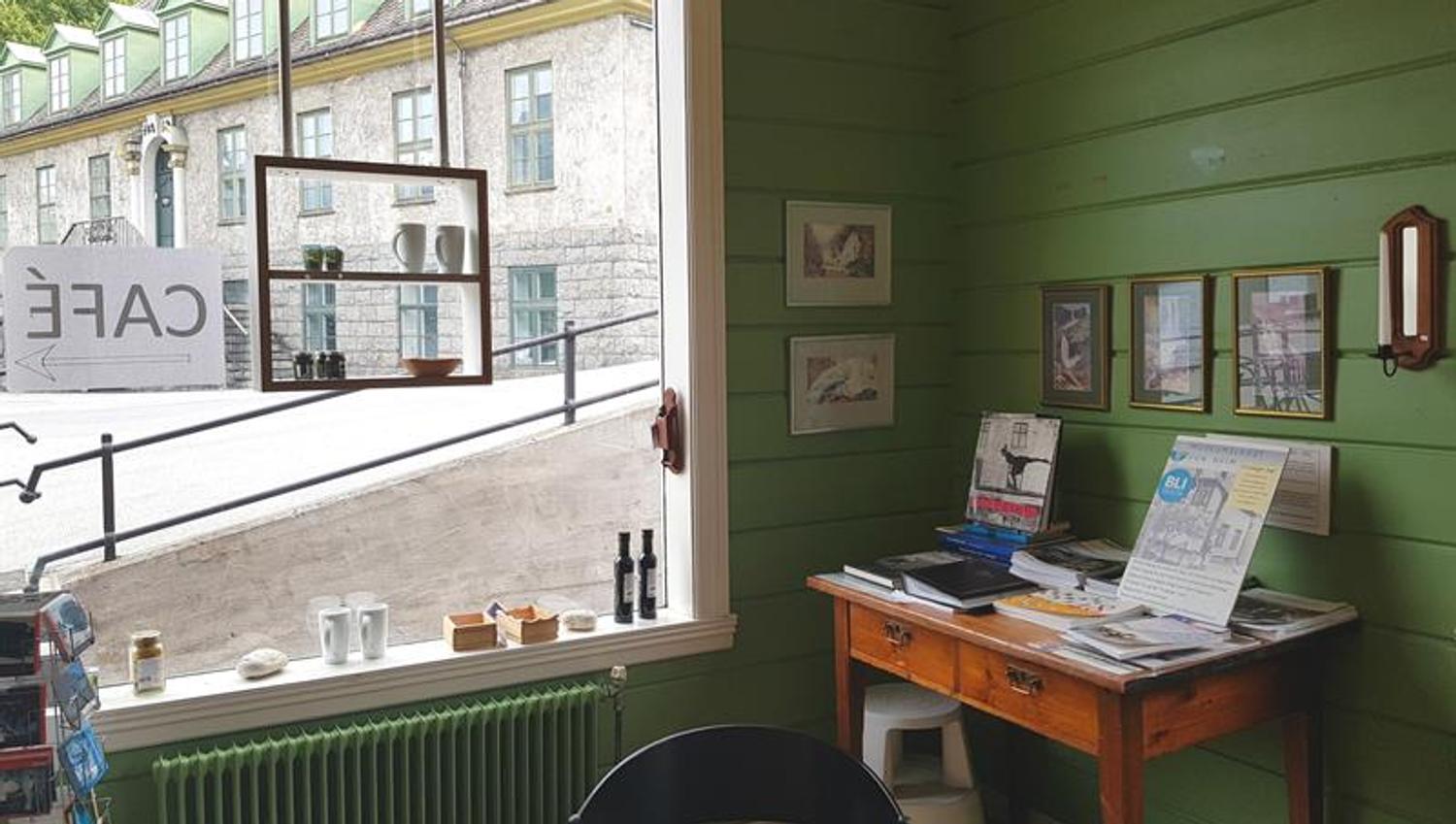 Café area at the Kraftmuseet, overlooking the museum grounds with souvenirs available for visitors.