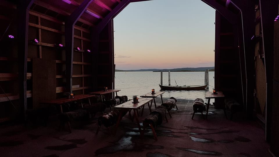 View from a boat house on Halne, with a pink sky in the background.