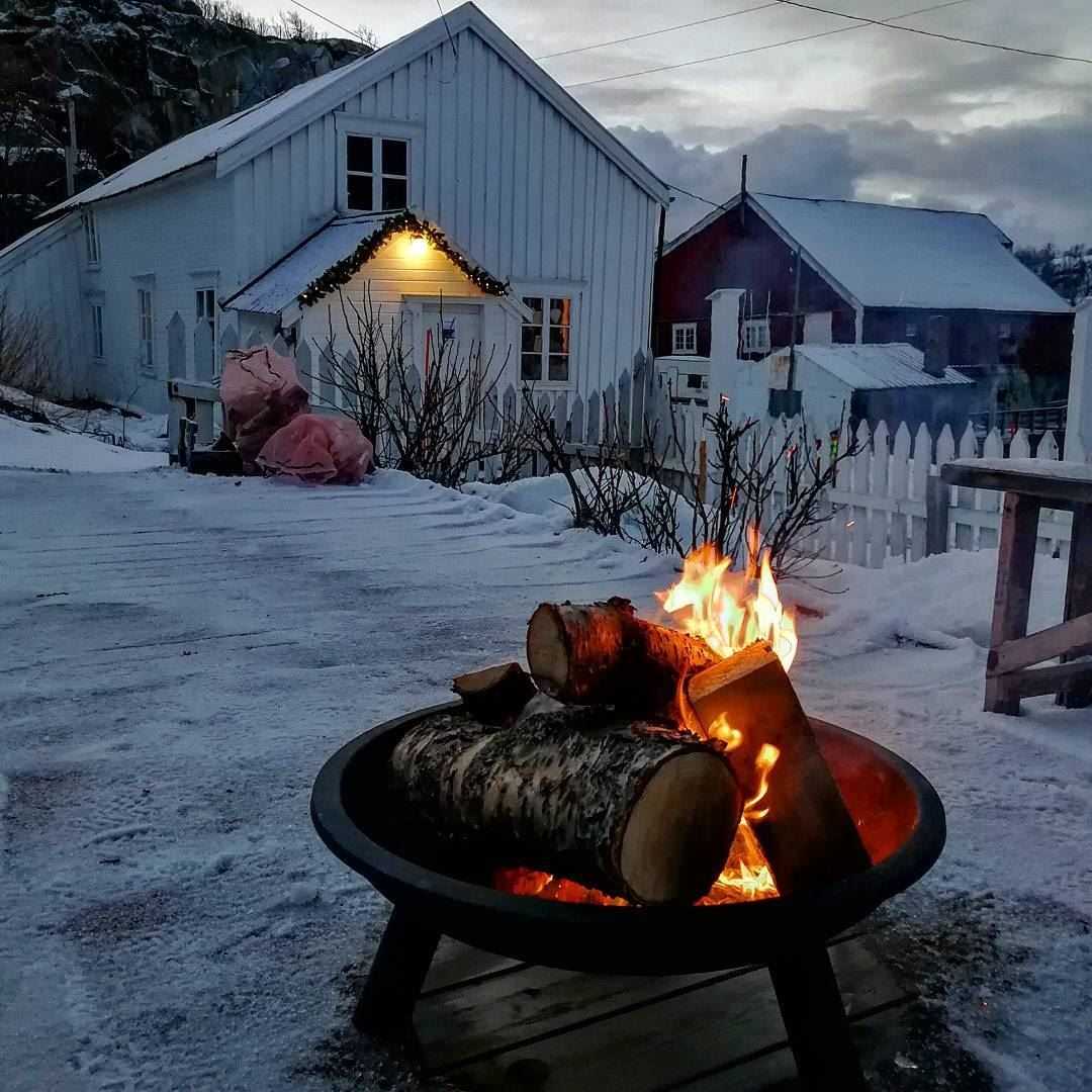 winter photo, outdoors of the venue, with a bonfire