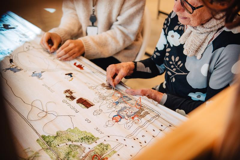 guests looking at a map
