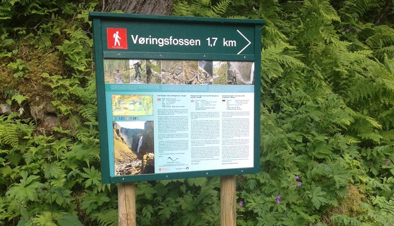 A sign with information about the hike.