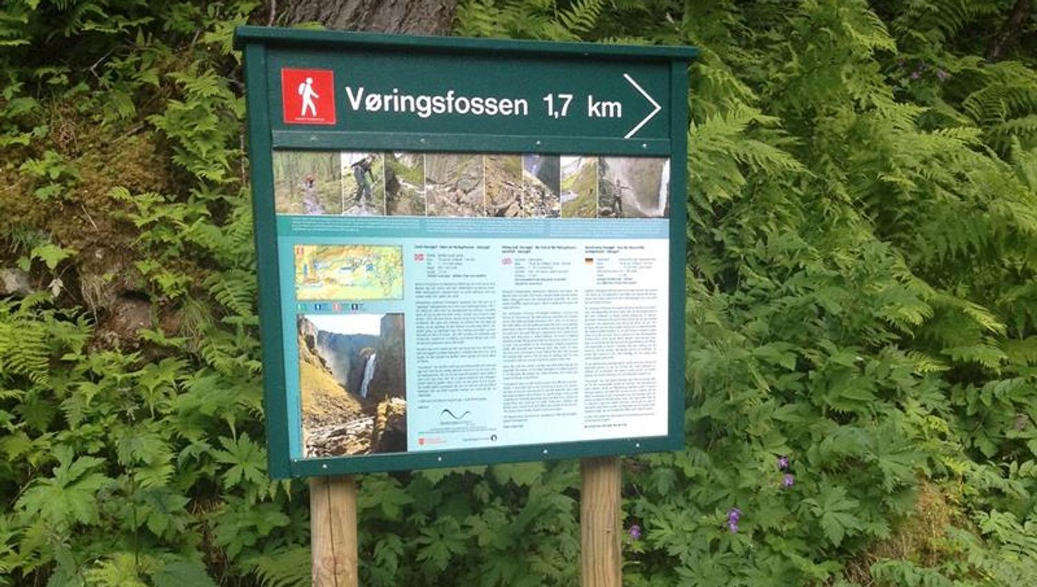 A sign with information about the hike.