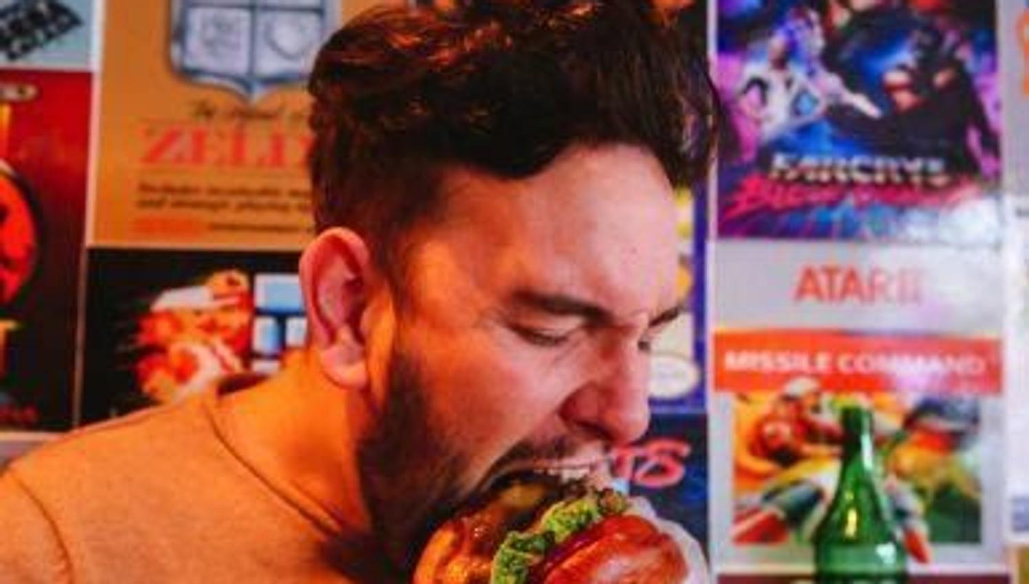 A man eating a burger