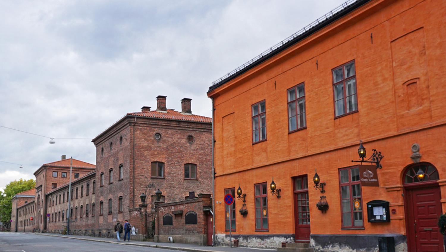 Exterior: Orange brick building.