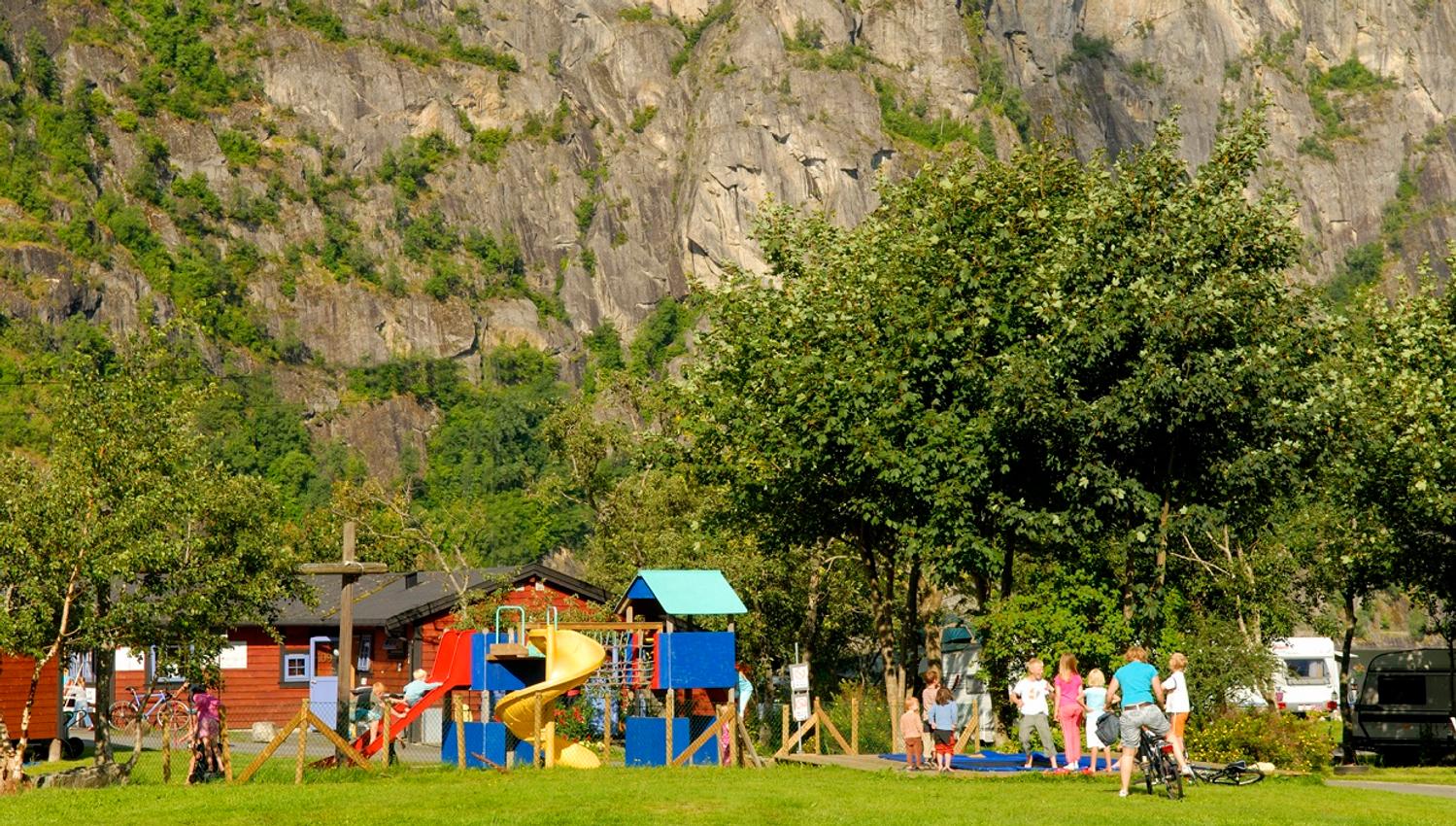 The playground at the campground, with children playing.