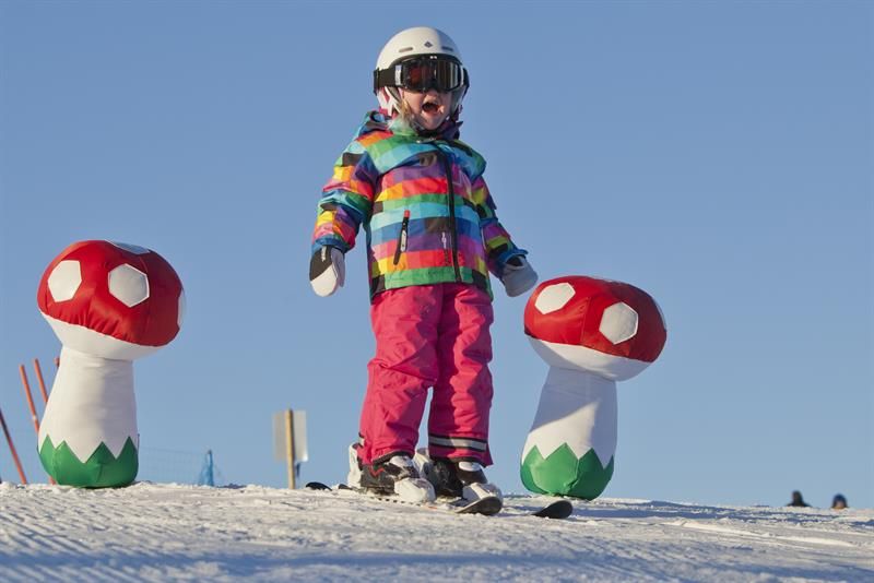 child on ski