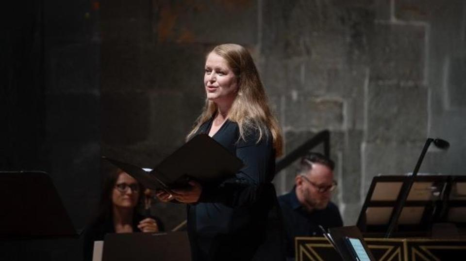 A baroque music performance in a historic stone church