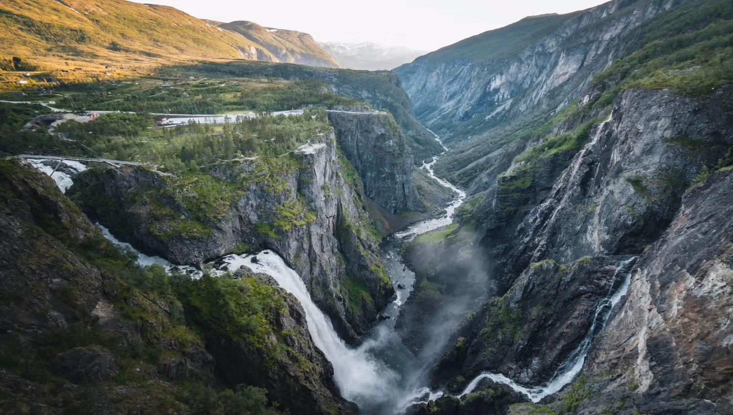 Vøringsfossen waterfall plunging into the Måbødalen canyon, surrounded by steep mountains in Hardanger.