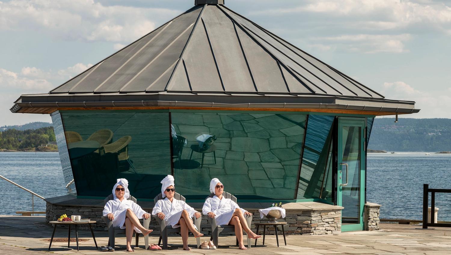 The sauna and three women in bath robes