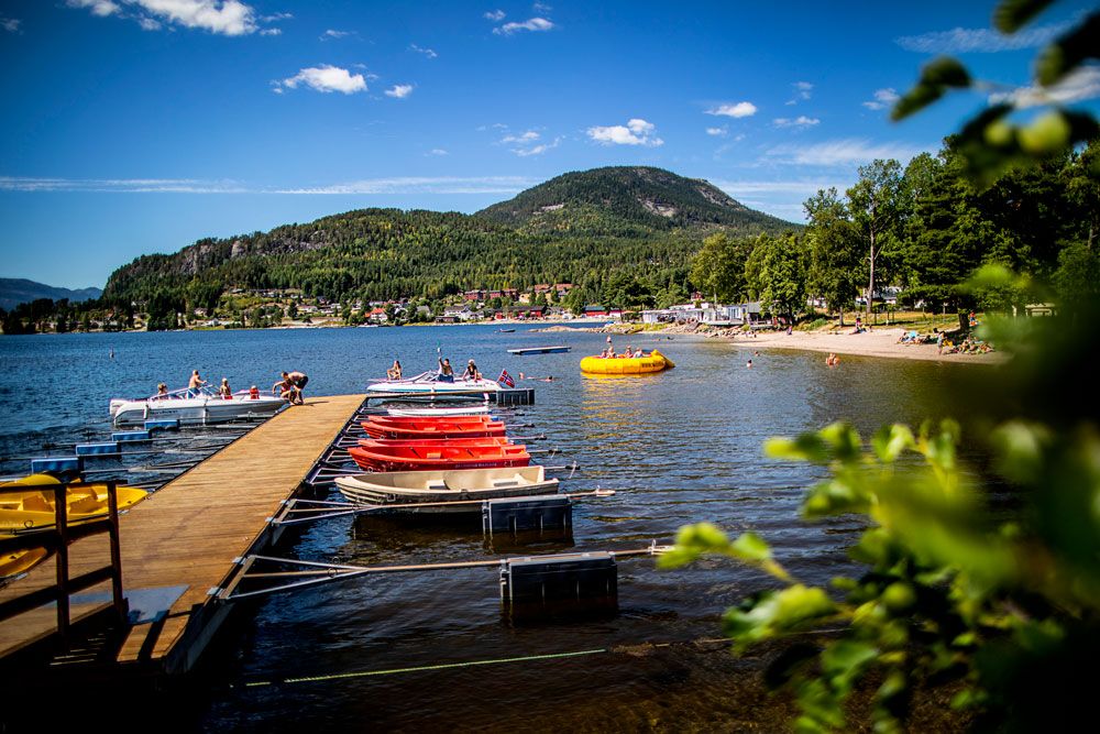 pier with rowing boats for rent at Straand Sommerland in Vrådal