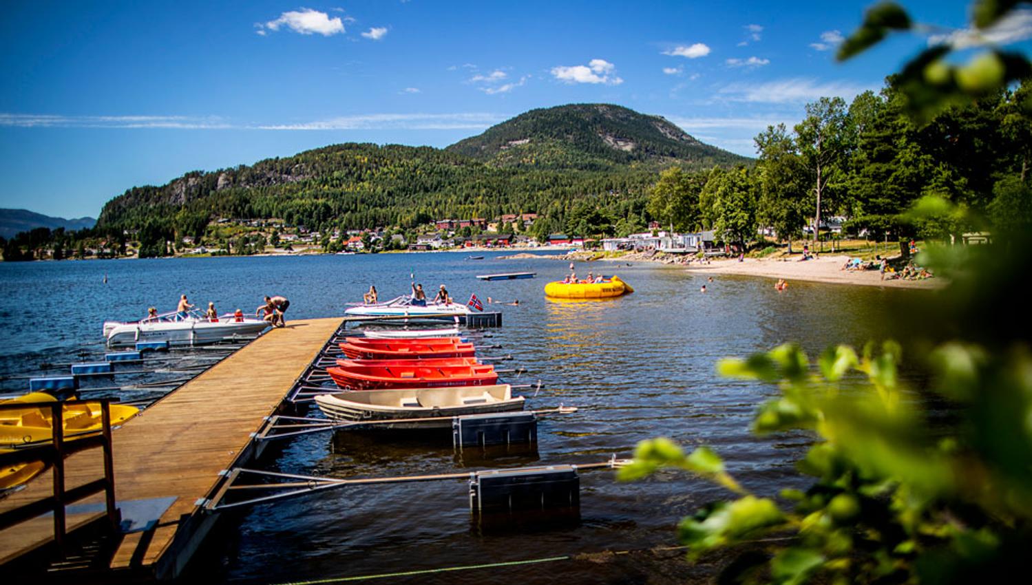 pier with rowing boats for rent at Straand Sommerland in Vrådal