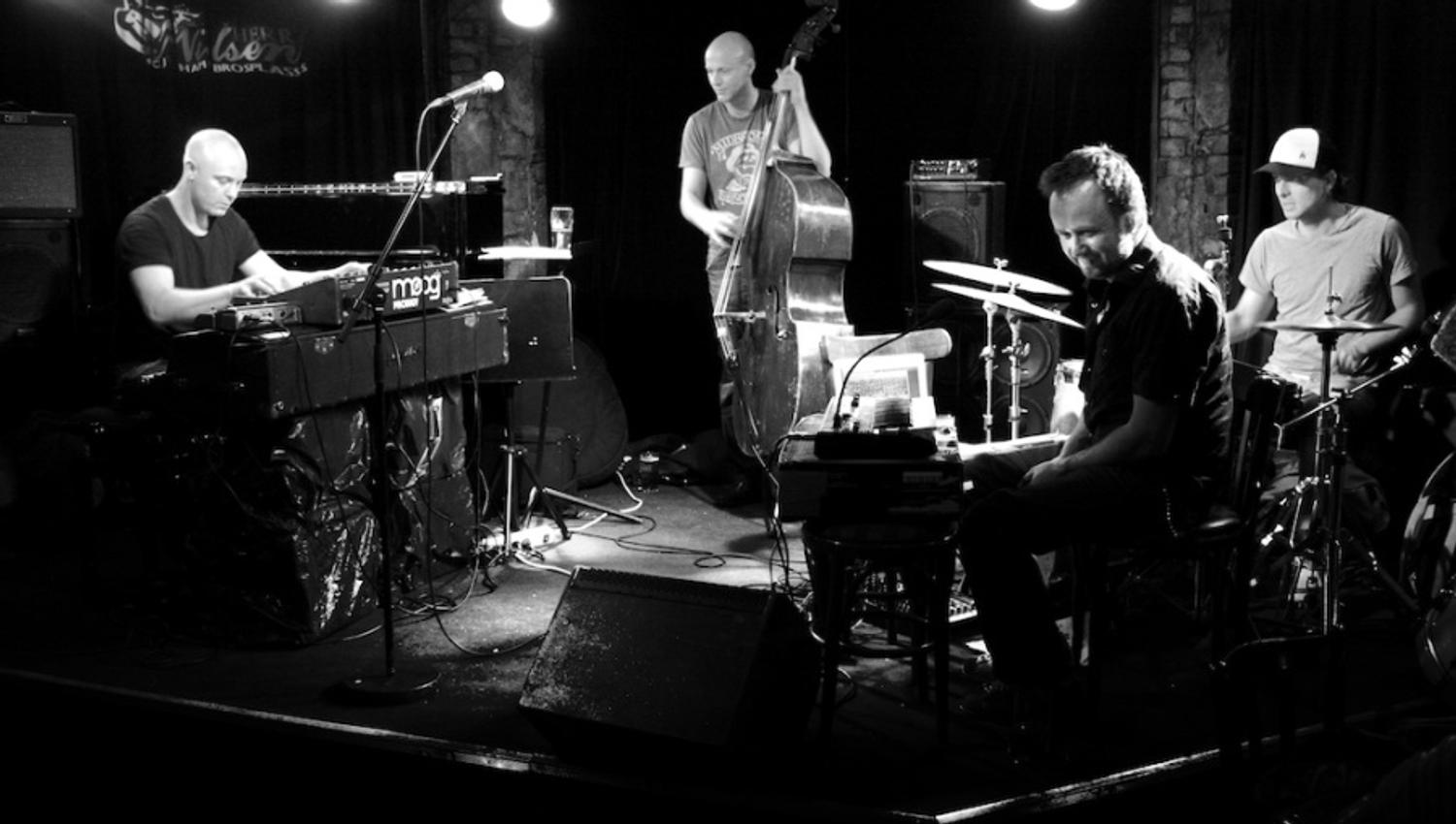 Black and white photo of a live performance.