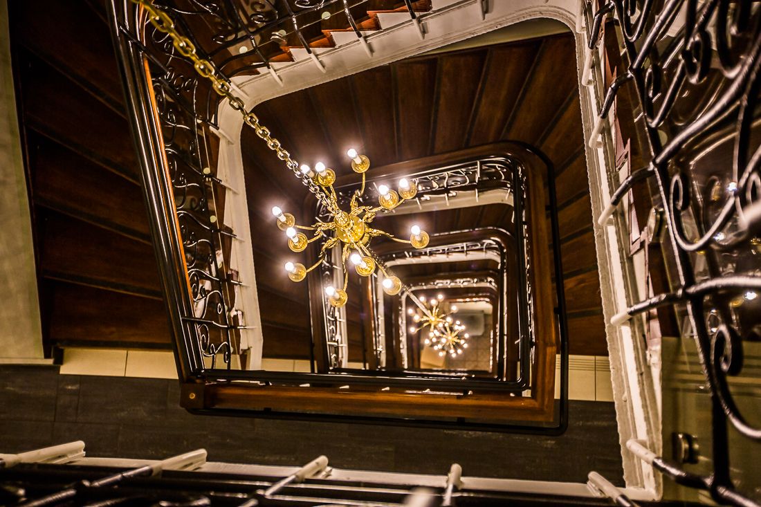19th century staircase. Wood and iron. Saga Hotel & Poshtel Oslo Central. Photo