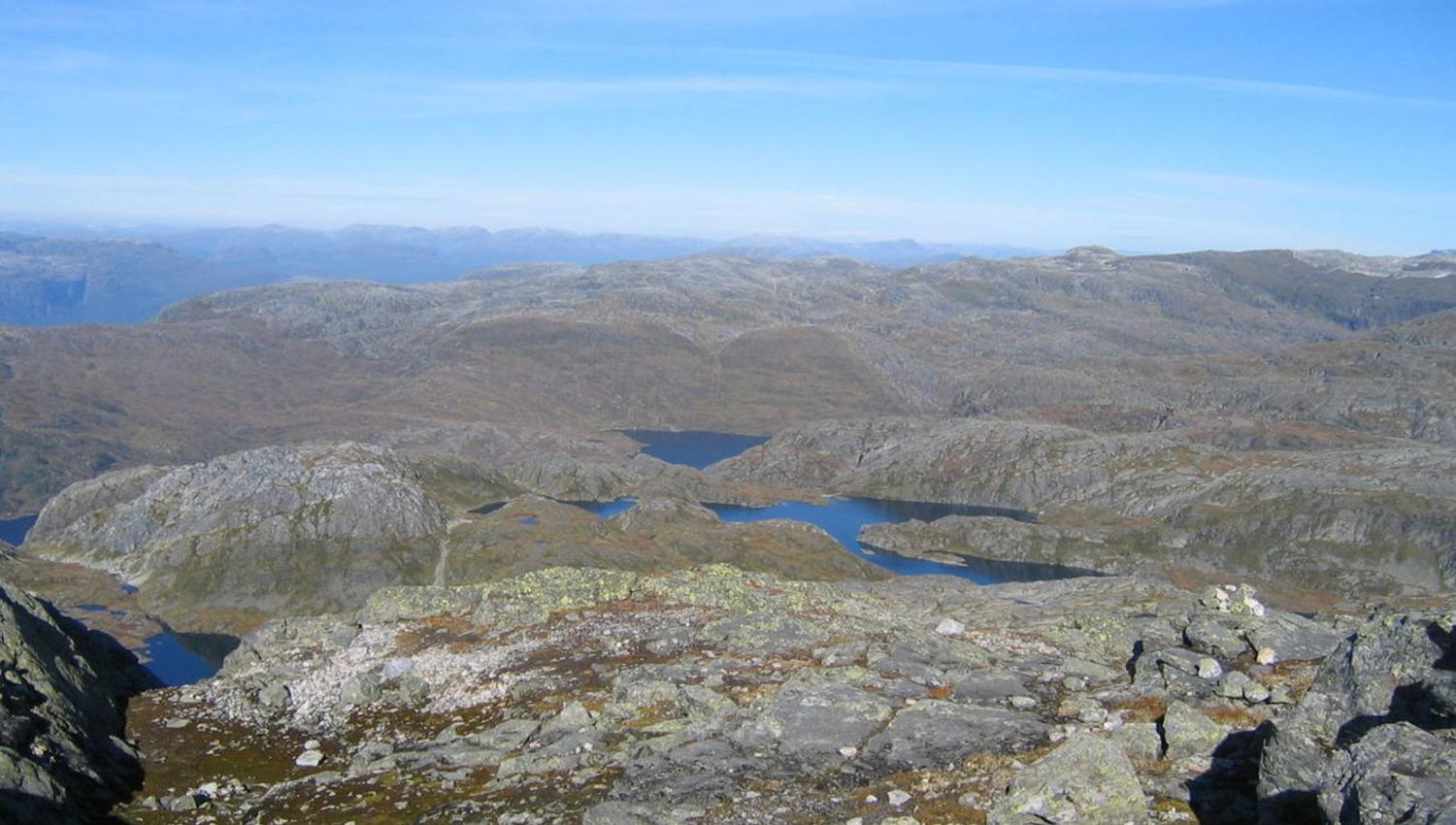 a view towards mountains and mountain lakes
