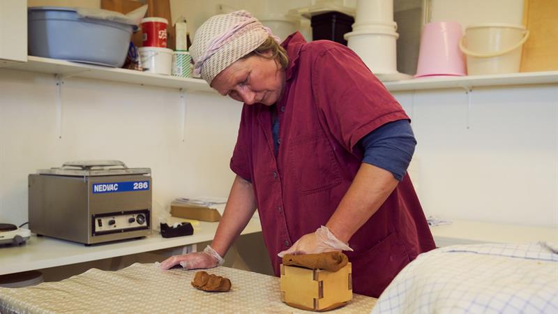 Cheesemaker makes cheese. 