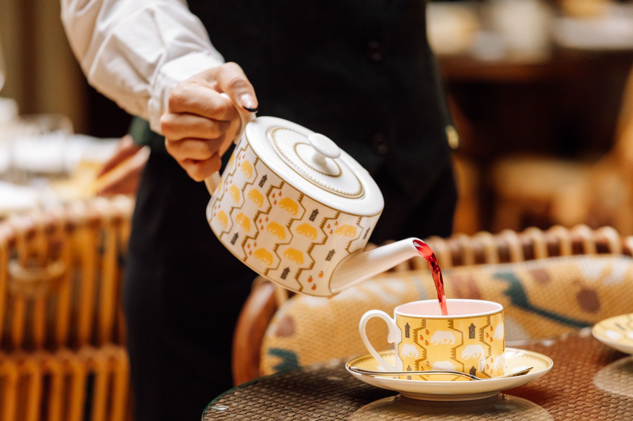 Coffee being poured into a cup