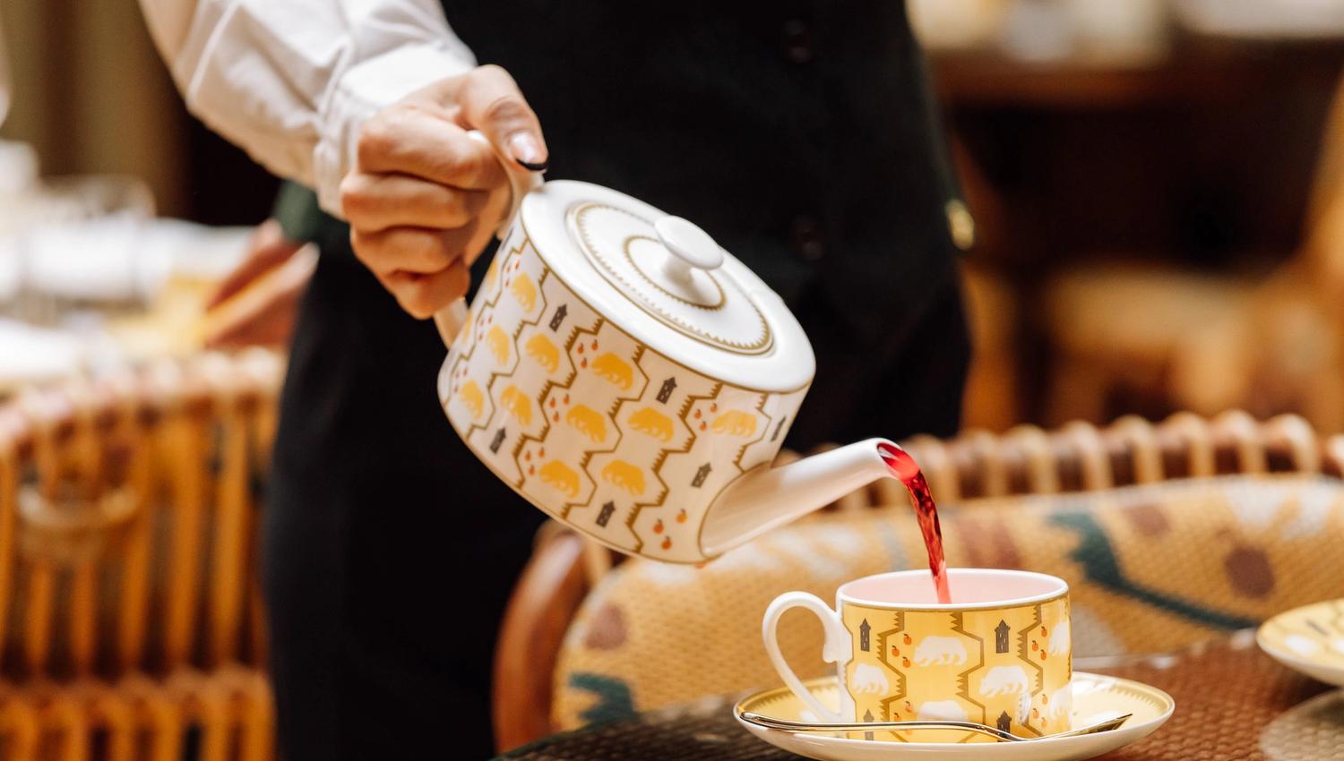 Coffee being poured into a cup