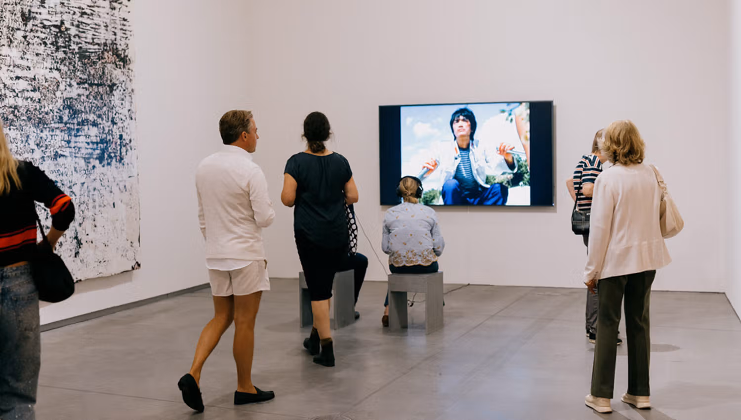 Visitors in an exhibition room