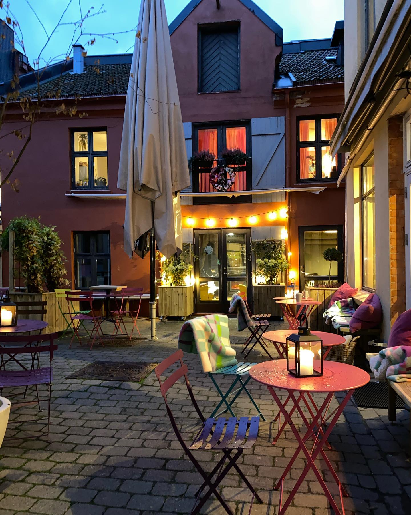 Backyard with pink table and chairs