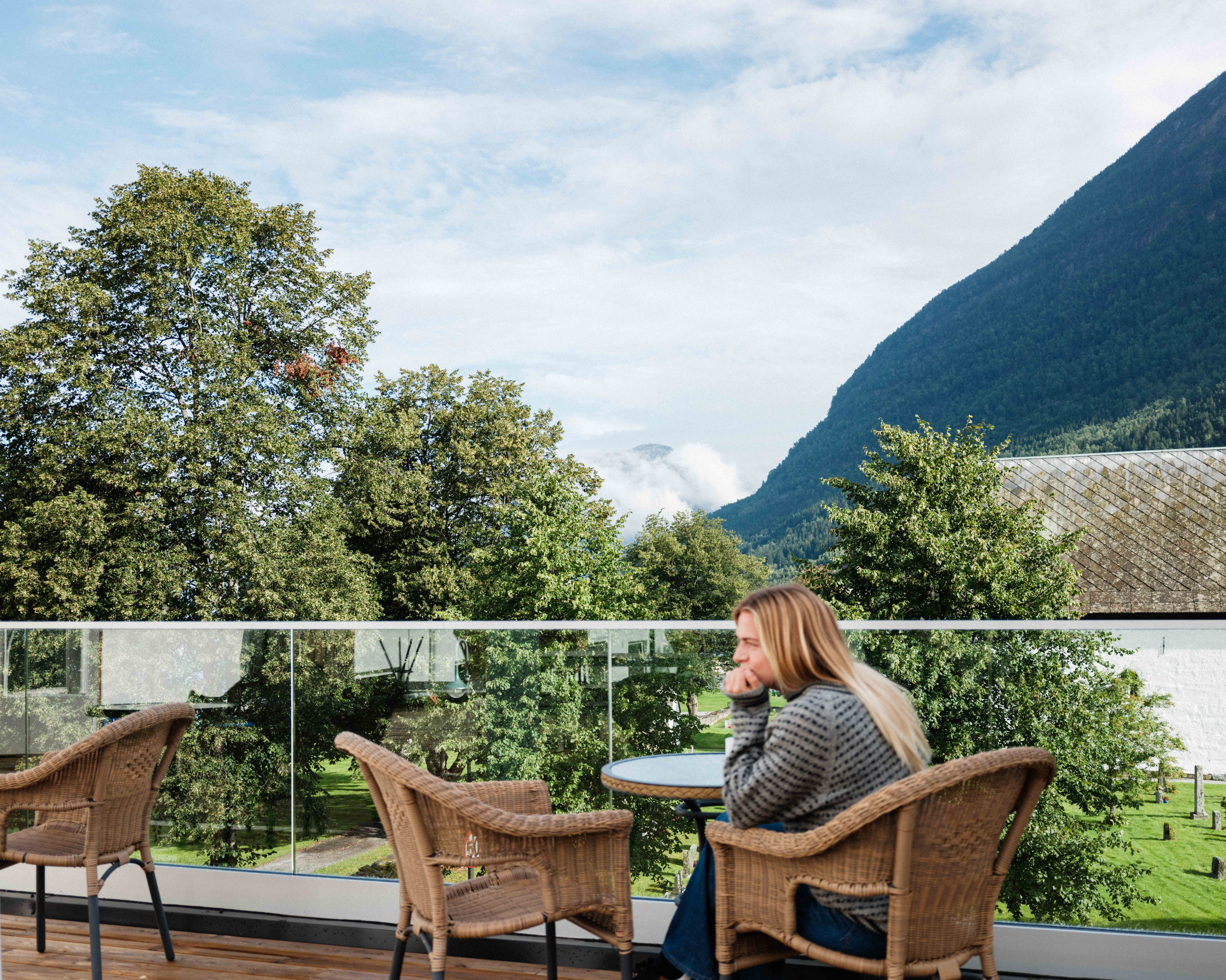 Peaceful morning coffee on the balcony at Kinsarvik Fjordhotel.