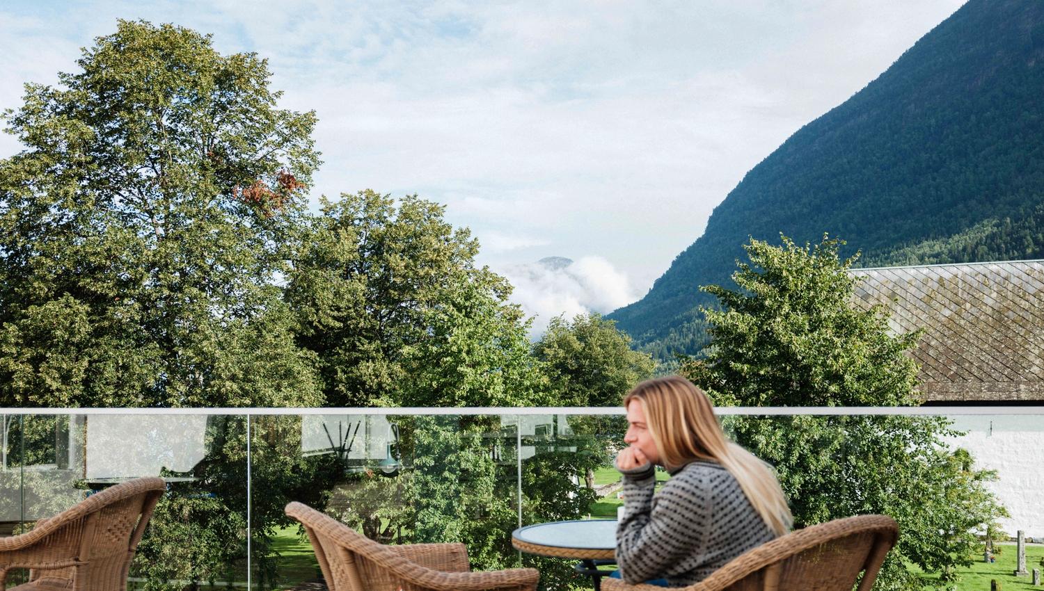 Peaceful morning coffee on the balcony at Kinsarvik Fjordhotel.