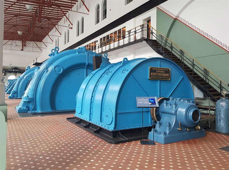 Detailed view of the powerful turbine machines from the early hydropower production era in Norway.