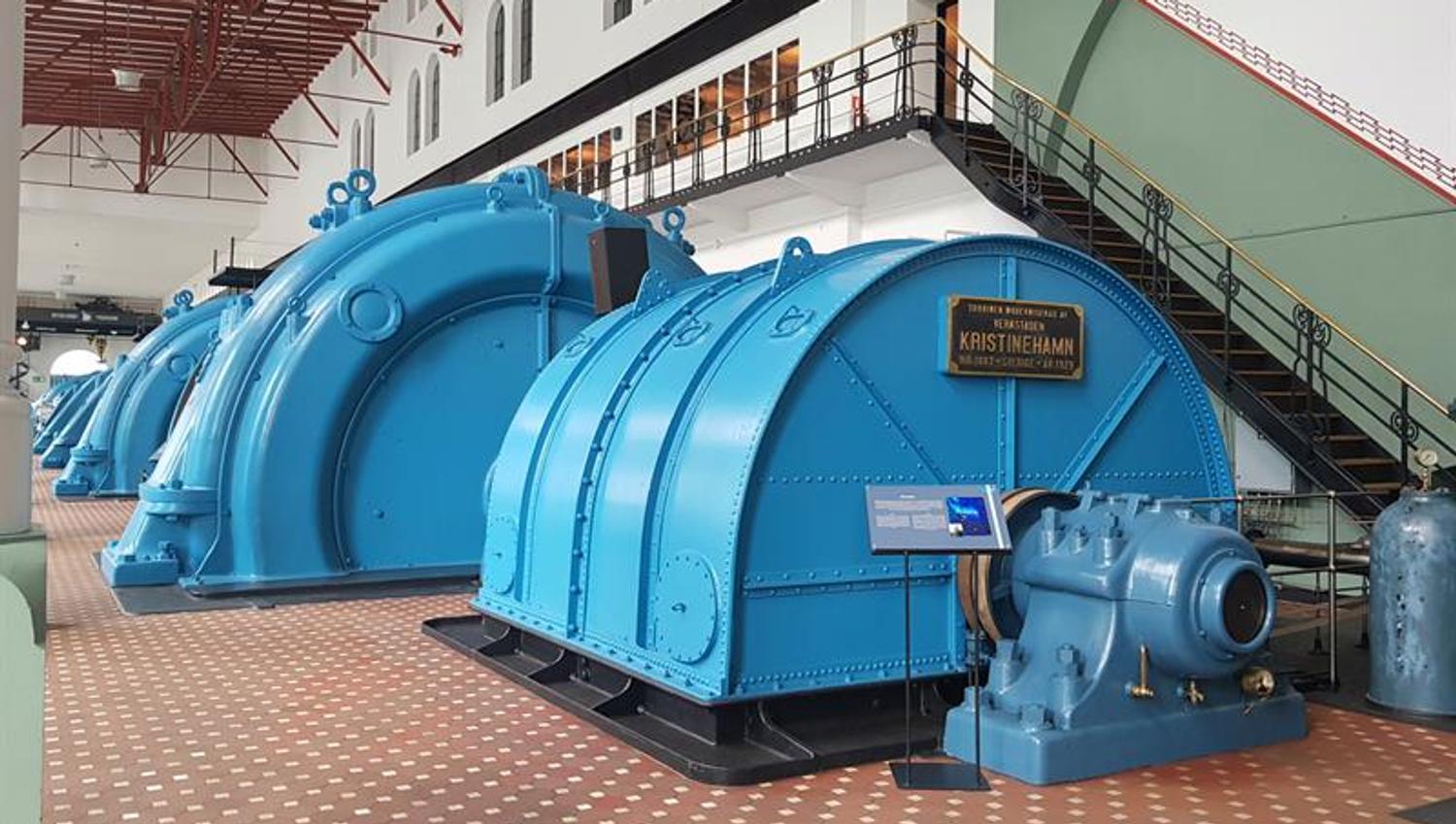 Detailed view of the powerful turbine machines from the early hydropower production era in Norway.