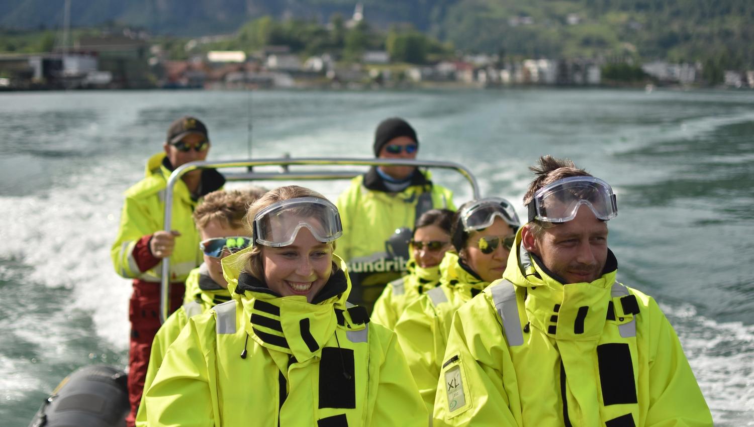 Excited passengers on a RIB boat in Hardanger, ready for speed, nature experiences, and spectacular waterfalls.