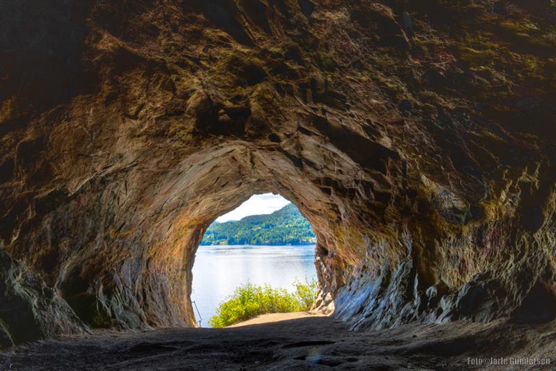 Mikaels cave in Skien with an opening towards the water 