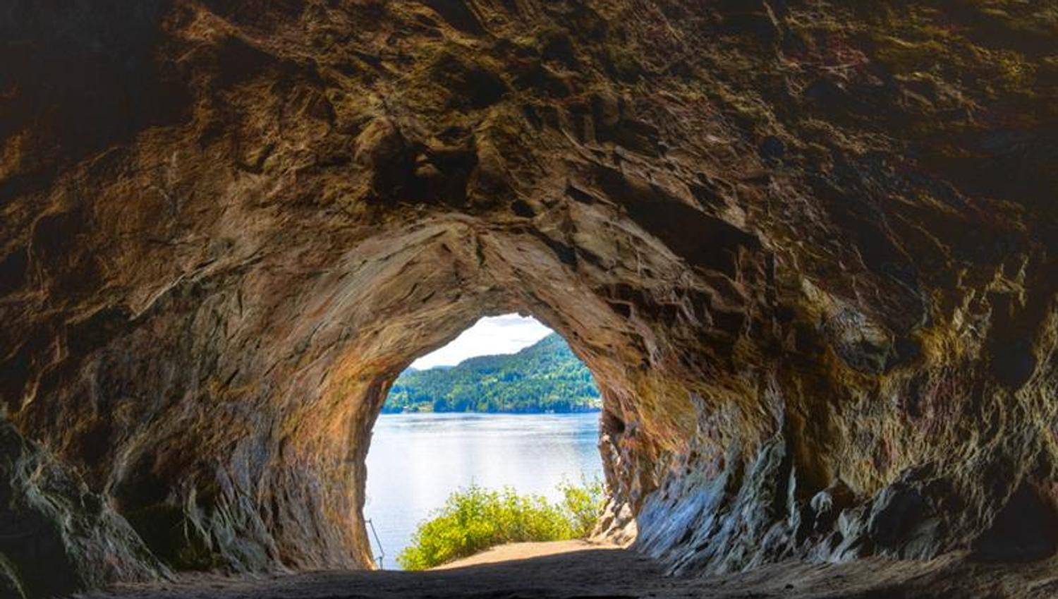 Mikaels cave in Skien with an opening towards the water