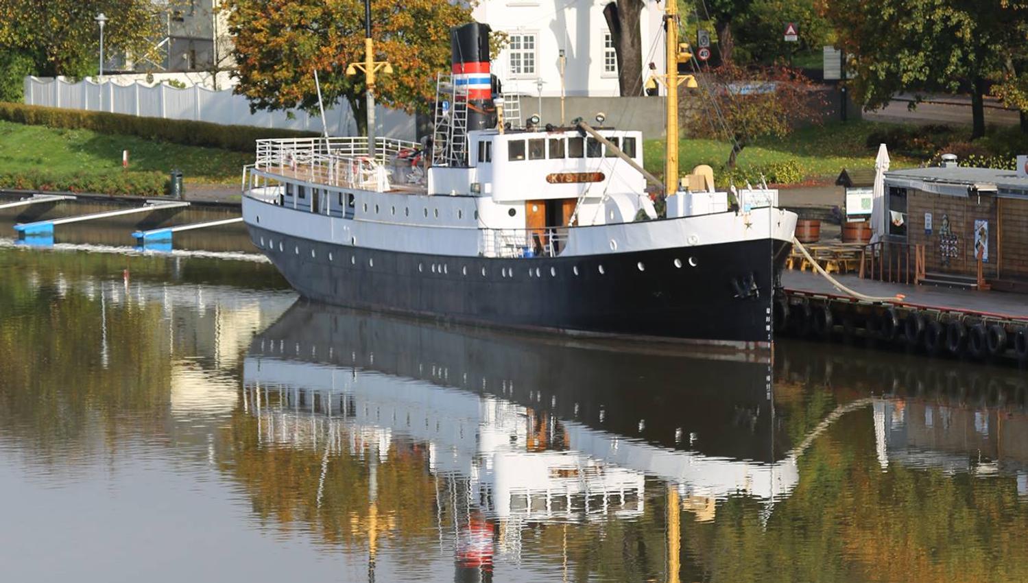 Large steamboat is docked.