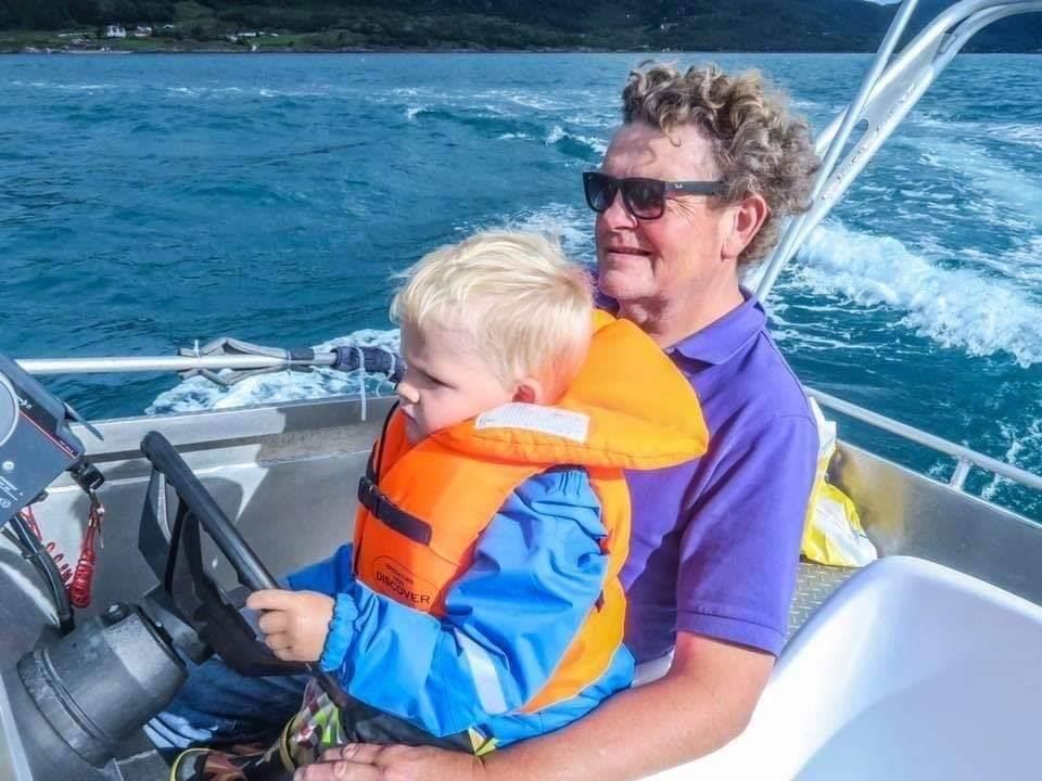 Man and child on a boat