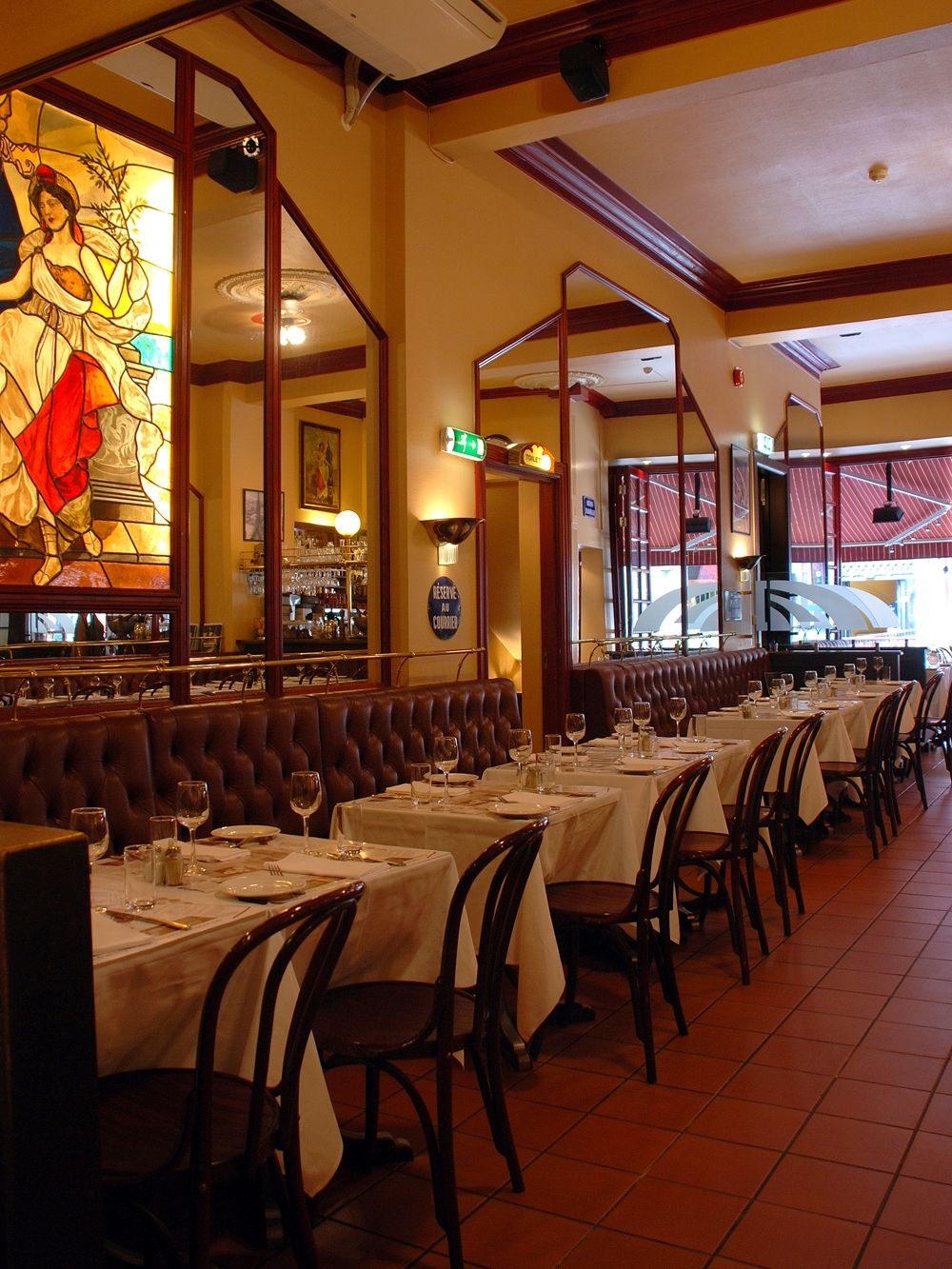Interior photo of tables, chairs and seating section.