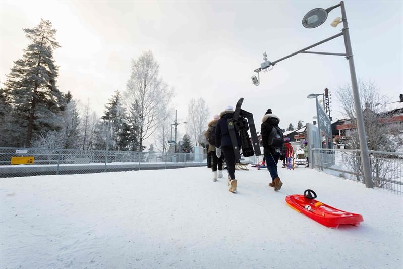 People walking towards the subway.