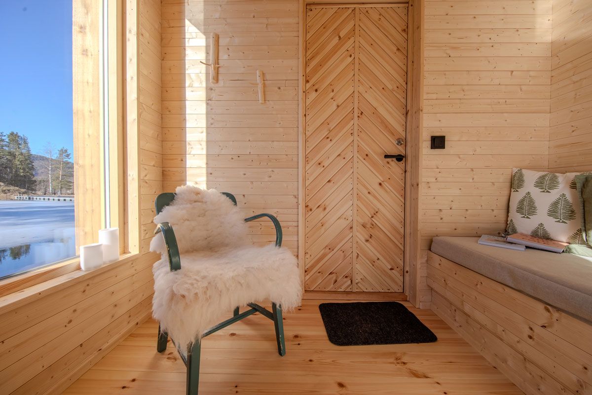 Cozy sitting area in the Forest Room Sauna