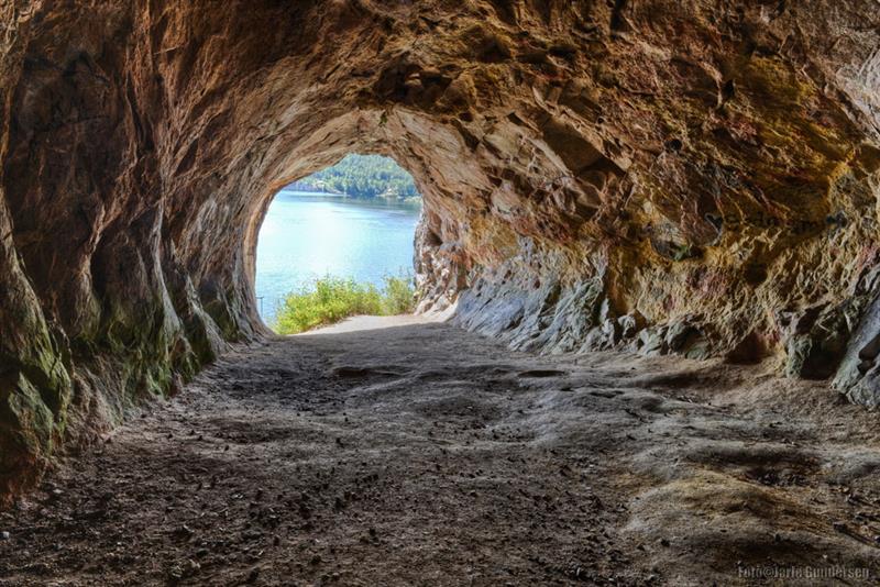 Mikaels cave in Skien with an opening towards the water 
