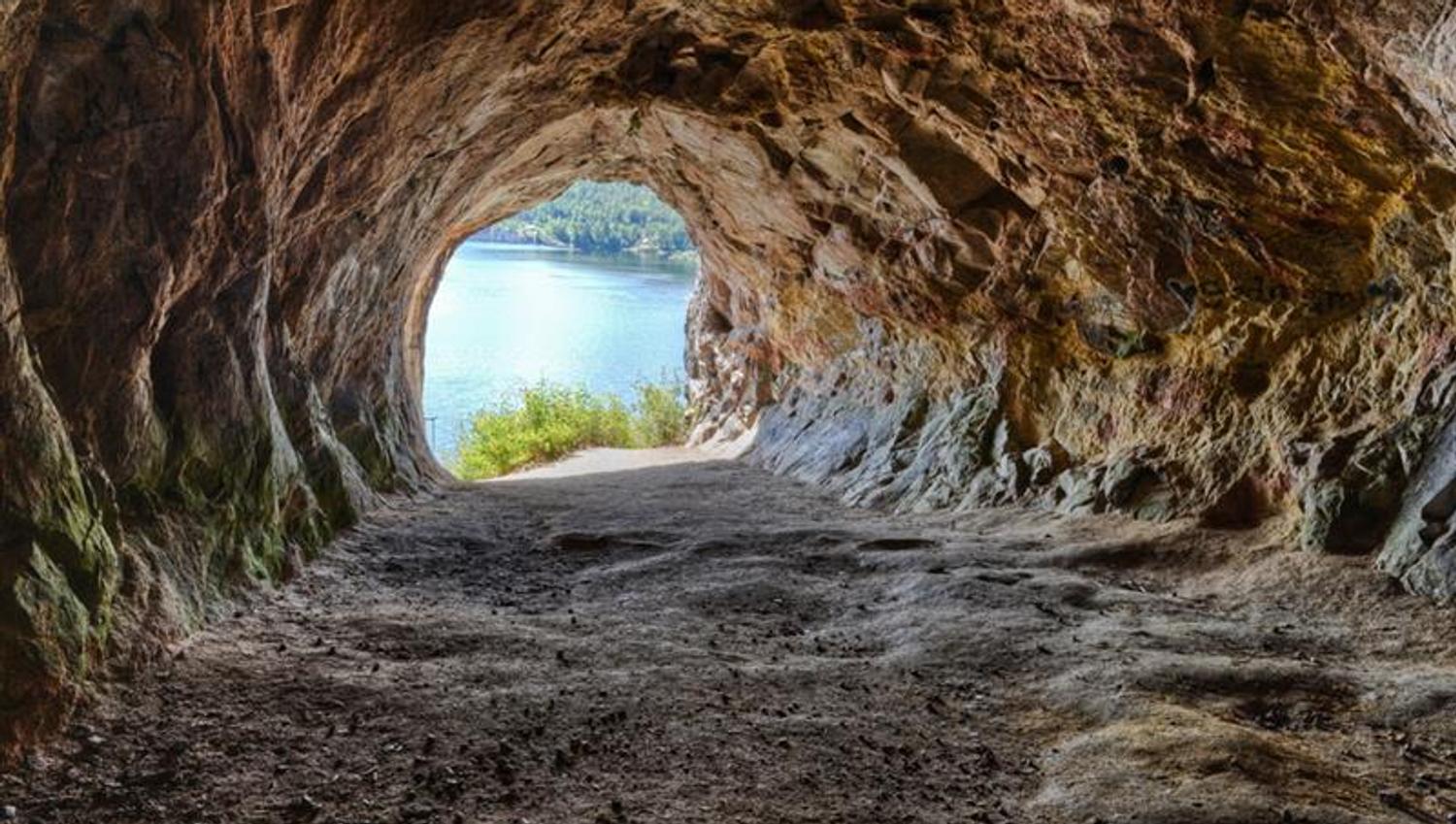 Mikaels cave in Skien with an opening towards the water