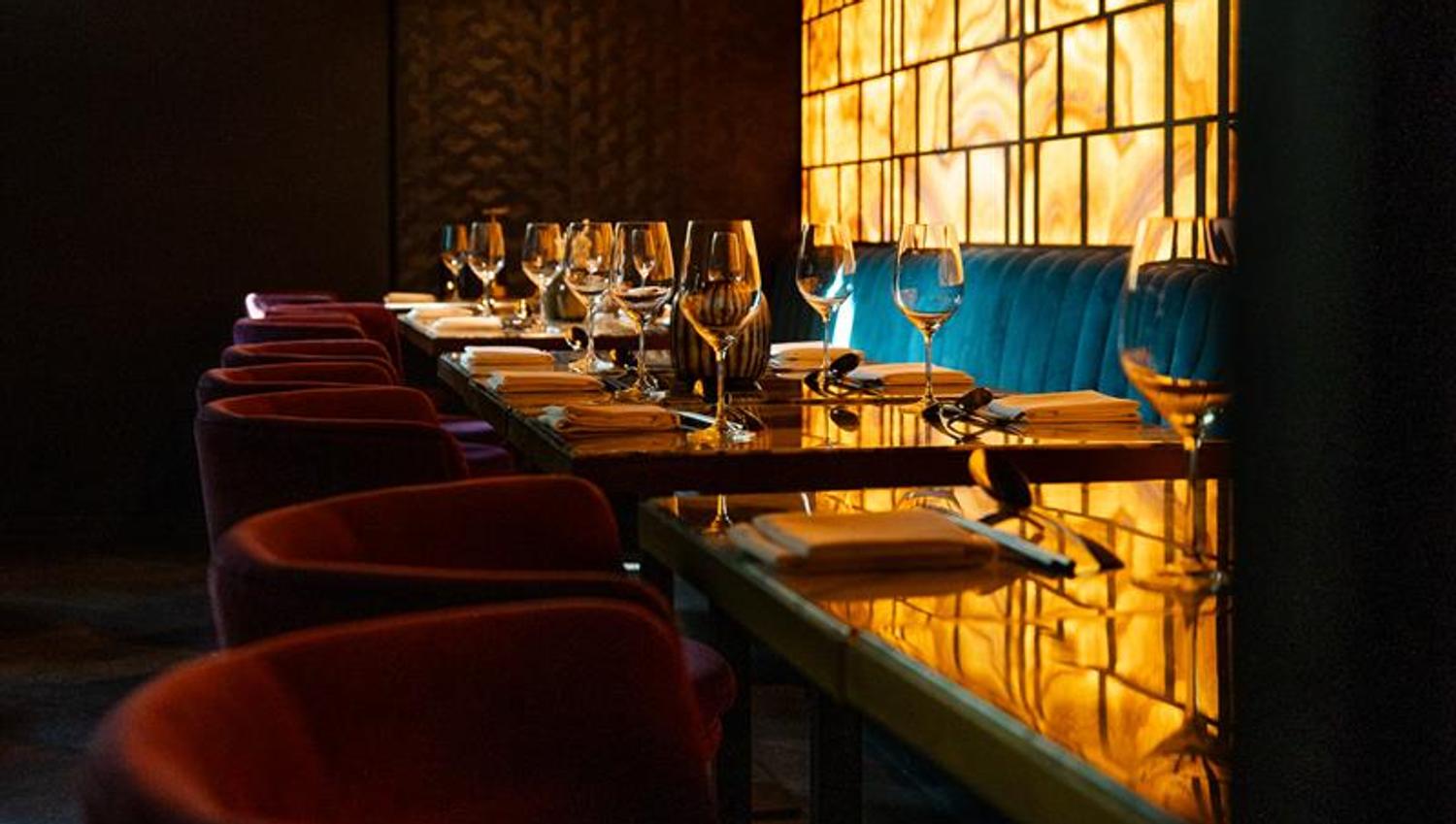 Tables set for dining and chairs
