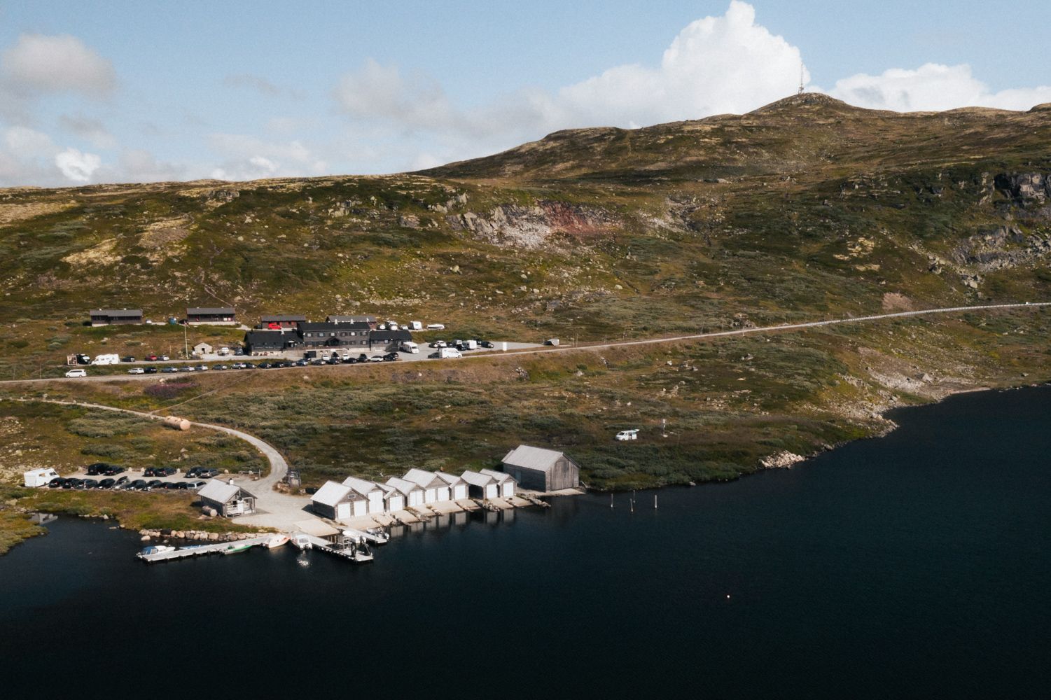 A drone shot of Halne mountain lodge and the harbour area.
