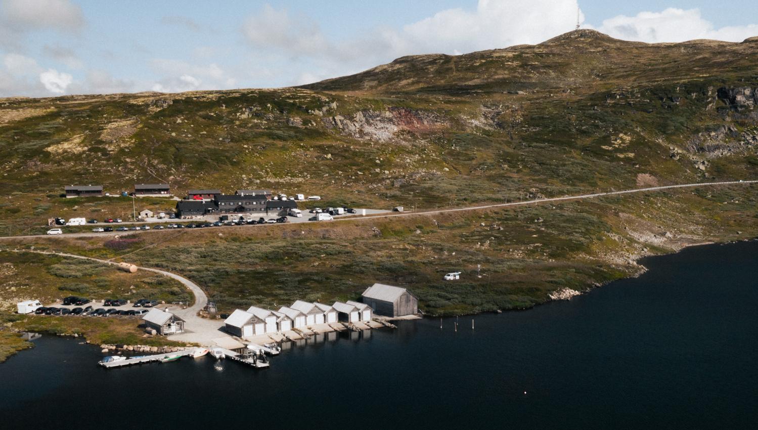 A drone shot of Halne mountain lodge and the harbour area.