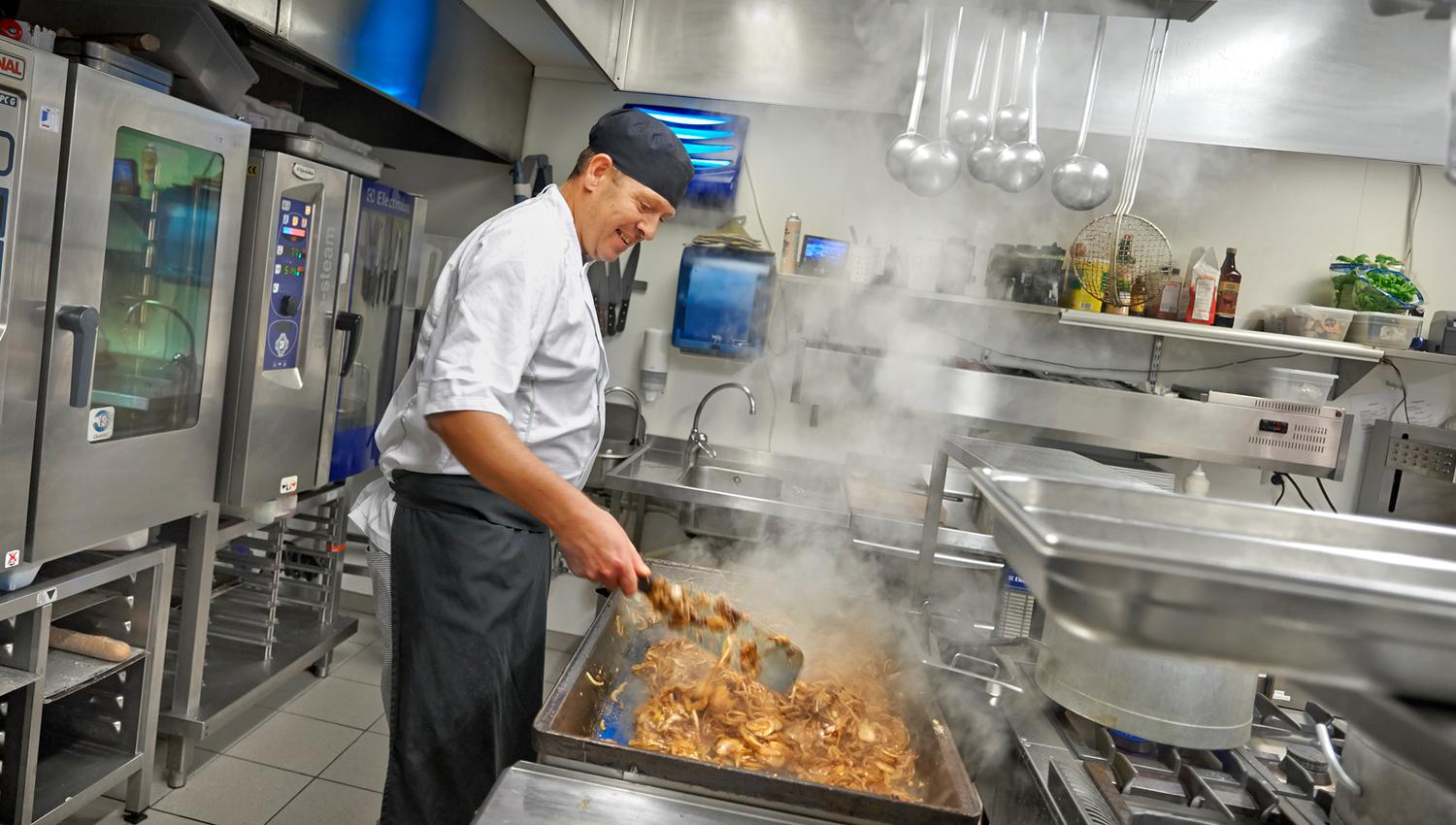 Chef prepares food