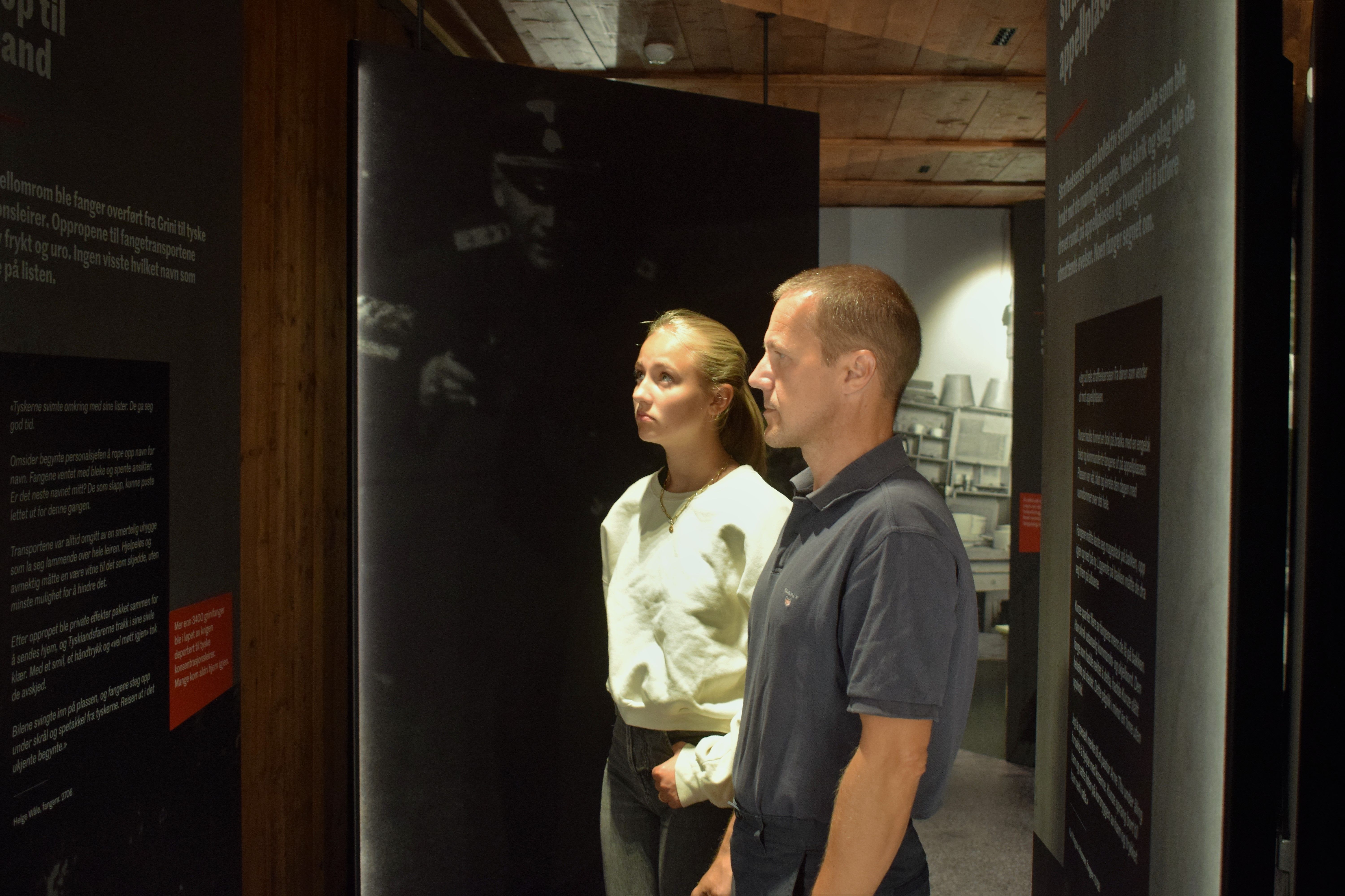 Girl and man in the exhibition