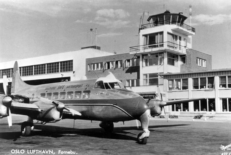 Airplane outside flight tower